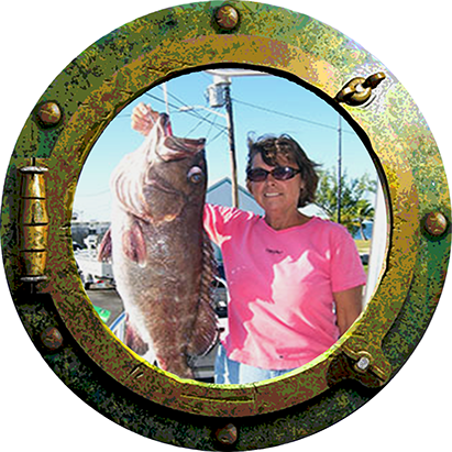 Dianne with a monster Grouper.